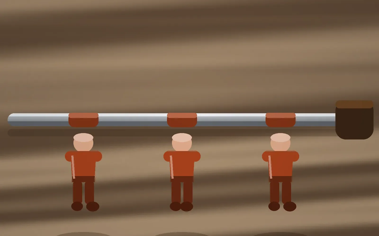 Barre d'attaque et figurines rouges prêtes pour un tir au baby-foot